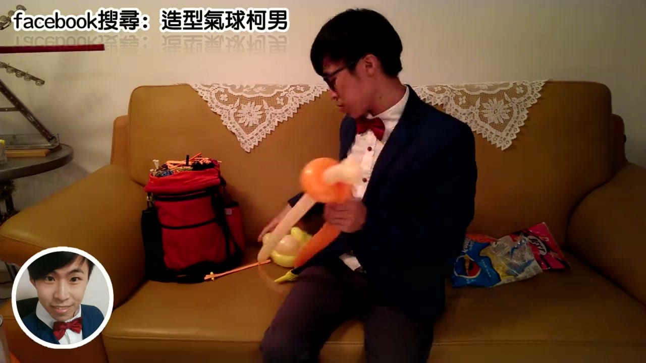 用膚色與橘色長條氣球折孫悟空身體的過程