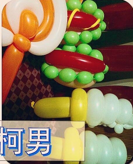 橘白棒棒糖、熱狗與冰淇淋甜筒造型氣球