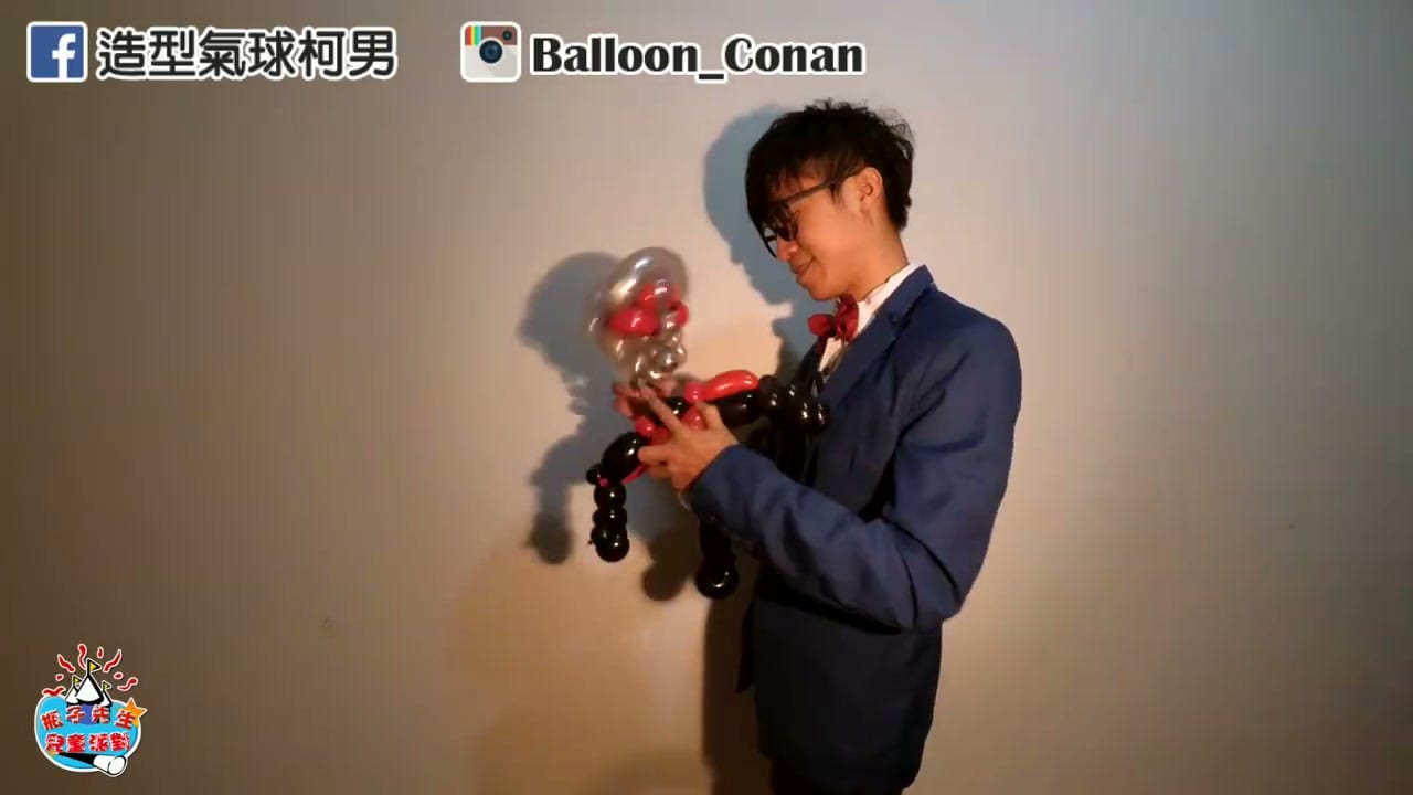 第五集影片中，柯男拿著完成的蟻人造型氣球